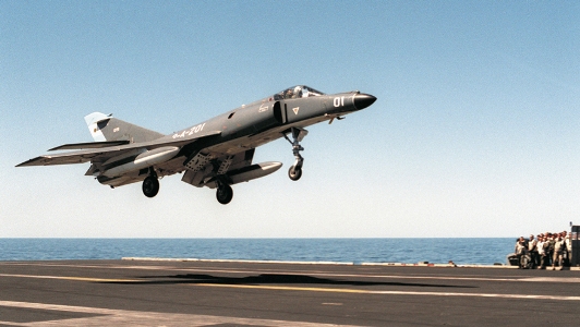 Pictured: An Argentine Navy Super Etendard lands on the USS Abraham Lincoln off the coast of South America. Photo: Tommy Lynaugh/US Navy.