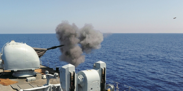 Pictured: A shell zooms away from HMS Liverpool during her fire mission last month. Photo: LA (Phot) Caz Davies/Royal Navy.